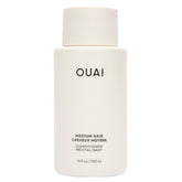 OUAI Medium Conditioner bottle front view for hydrated, frizz-controlled hair.
