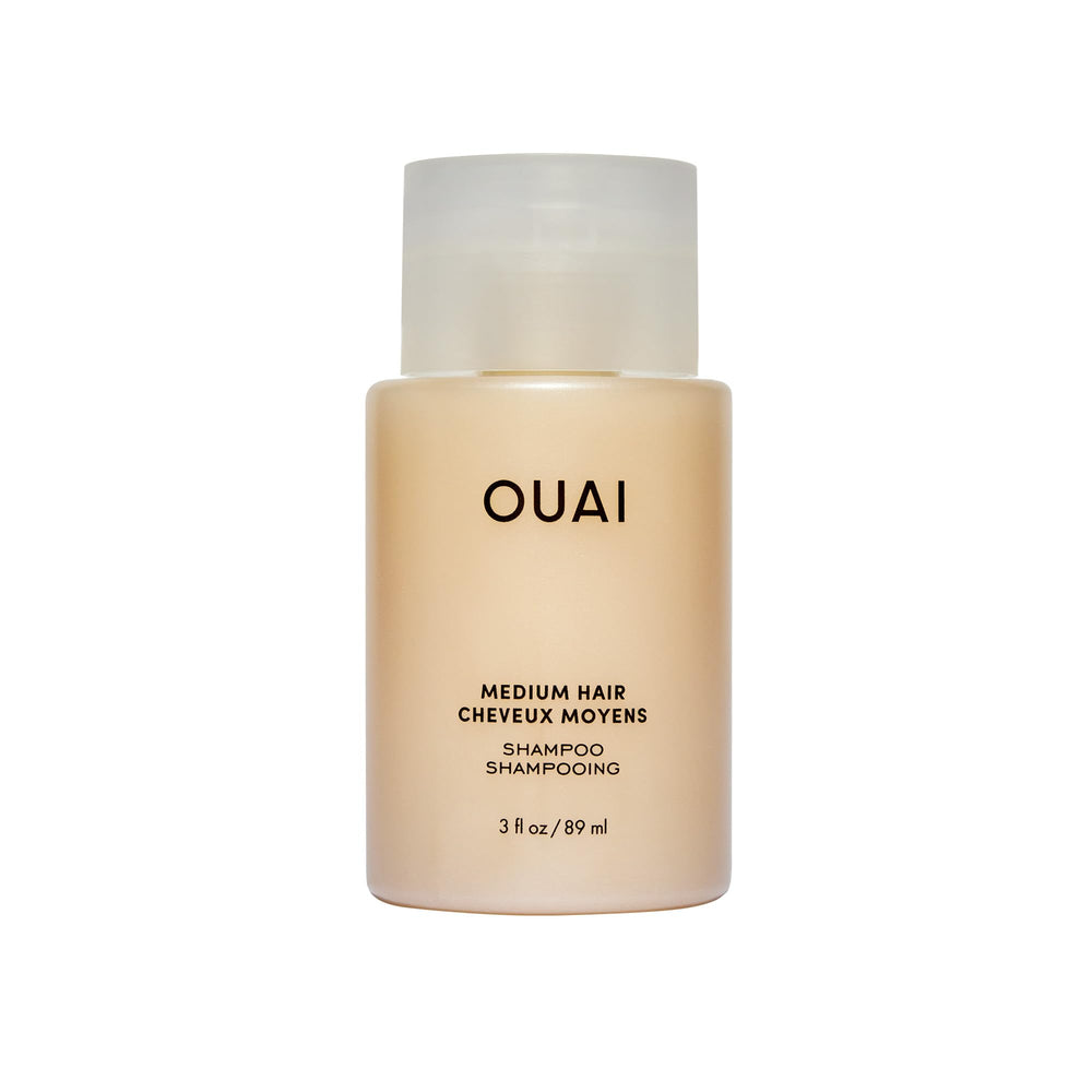 OUAI Medium Shampoo Travel Size bottle front view, a compact travel-friendly packaging.
