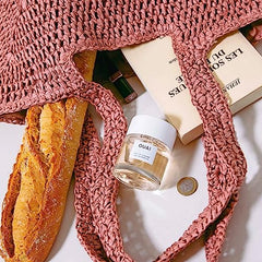OUAI Rue St Honore spray application demonstrates easy application on pulse points for scent