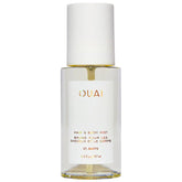 OUAI St. Barts hair and body mist bottle close-up showcasing tropical scent
