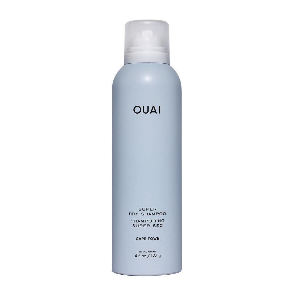 OUAI Super Dry Shampoo bottle pour showing quick oil absorption for refreshed hair