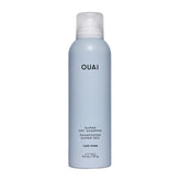 OUAI Super Dry Shampoo bottle pour showing quick oil absorption for refreshed hair
