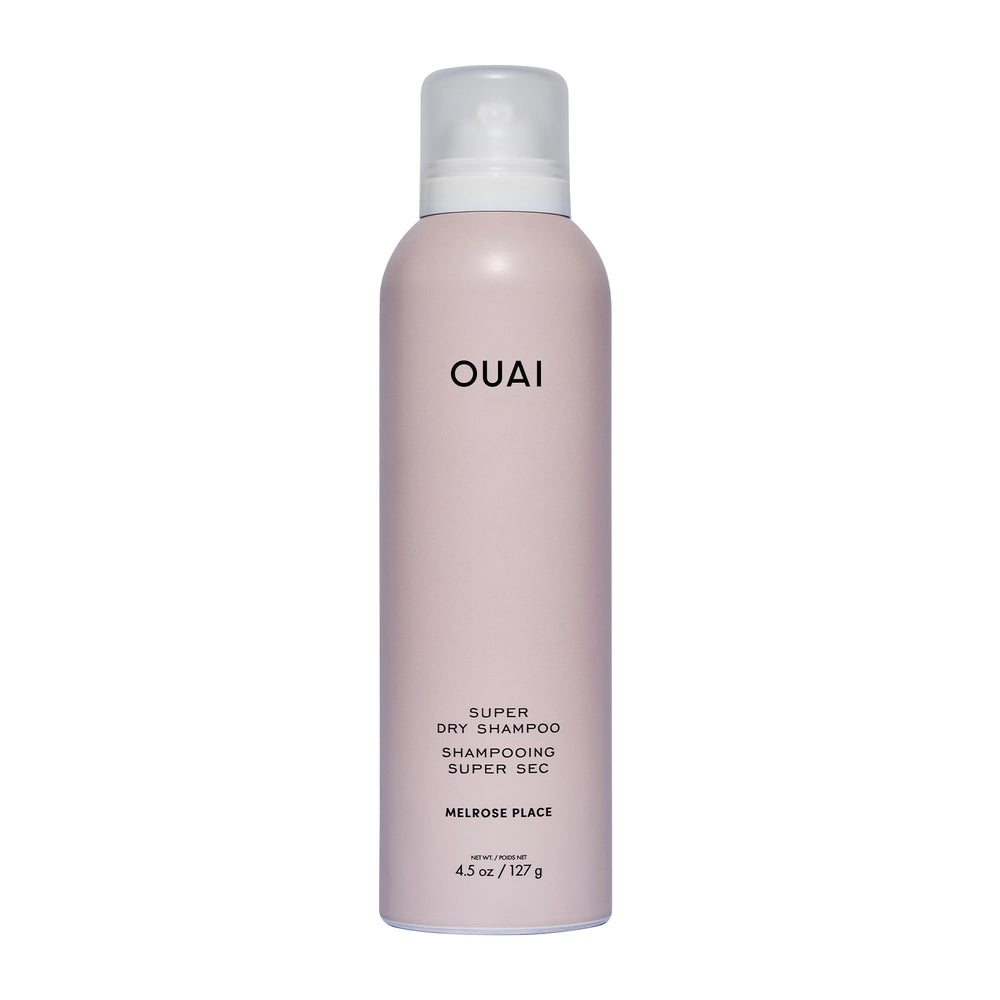 OUAI Super Dry Shampoo spray can at distance demonstrates oil absorption from roots