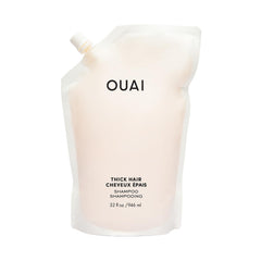 OUAI Thick Shampoo refill bottle highlights a hydrating formula for thick hair.