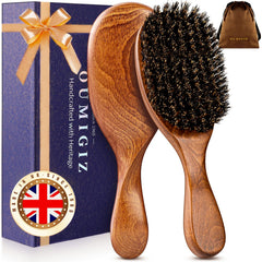 OUMIGIZ boar bristle brush close-up shows premium natural bristles for smooth detangling.