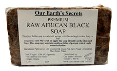 Our Earth's Secrets Raw African Black Soap bar front view for natural cleansing and gentle exfoliation.