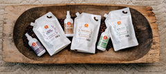 Closeup of the Juices & Berries label highlighting the herbal-infused formula for nourishment