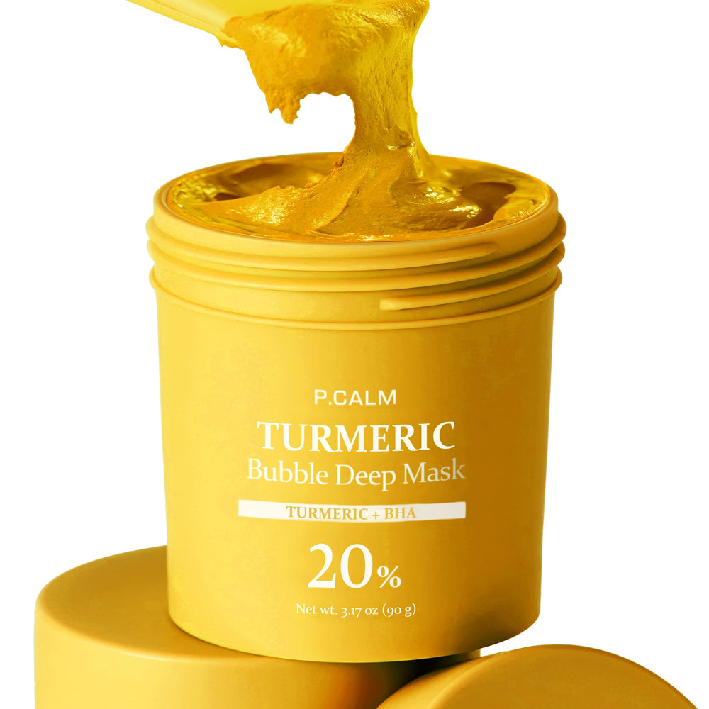 P.CALM Turmeric Bubble Deep Mask jar closeup shows creamy clay transforming into bubbles for a spa-like cleanse.