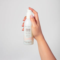 Pacifica Vegan Collagen Cleanser flower-milk extract close-up with calming botanicals.