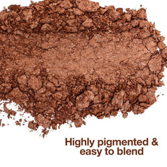 Palladio Baked Bronzer with brush swirl demonstrates easy blending for natural warmth.