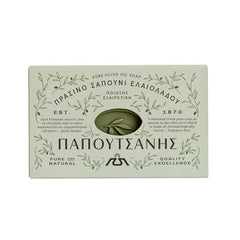 Papoutsanis olive oil castile soap bar resting on sink with hydrating lather.