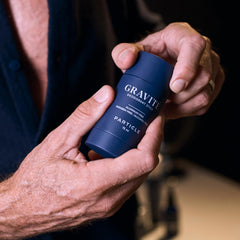 Particle Gravité deodorant top notes featuring bergamot and grapefruit for an energizing start