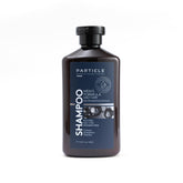Particle Hair Thickening Shampoo bottle pour for a refreshing daily cleanse and masculine scent.