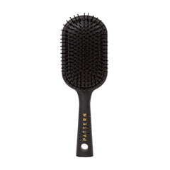 PATTERN Beauty paddle brush heat-resistant bristles for smoother detangling and styling.