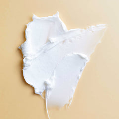 PATTERN Styling Cream swirl on fingertip ready for wash-and-go styles