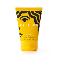 PATTERN Leave-In Conditioner bottle close-up highlighting moisture and detangling benefits