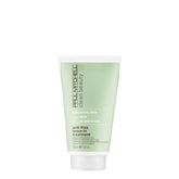 Paul Mitchell Clean Beauty anti-frizz leave-in bottle demonstrates smoothing formula with humidity protection.