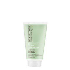 Paul Mitchell Clean Beauty anti-frizz leave-in bottle demonstrates smoothing formula with humidity protection.