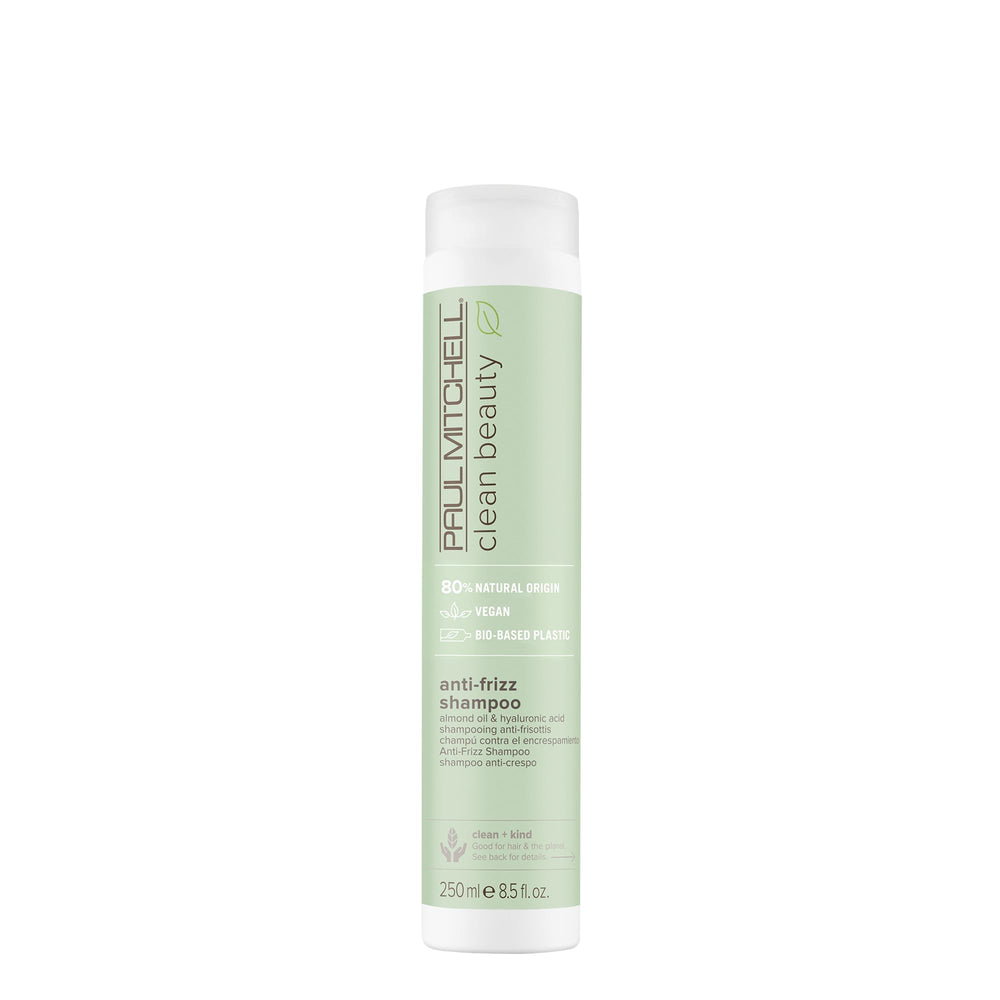 Paul Mitchell Clean Beauty anti-frizz shampoo bottle pour promotes frizz control for textured hair.