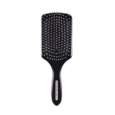 Paul Mitchell Pro Tools 427 Paddle Brush with wide paddle for smoother blowouts and lift.