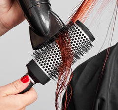 Paul Mitchell Pro Tools large brush corkscrew vegan bristles close-up for smoother finish.
