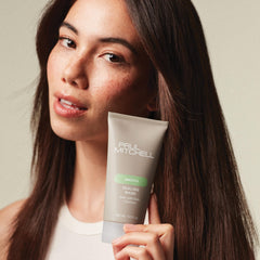 Paul Mitchell Sealing Mask hair application — smooths frizz during daily styling.