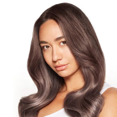 Paul Mitchell Super Skinny Serum wet application highlights easy distribution through damp hair.