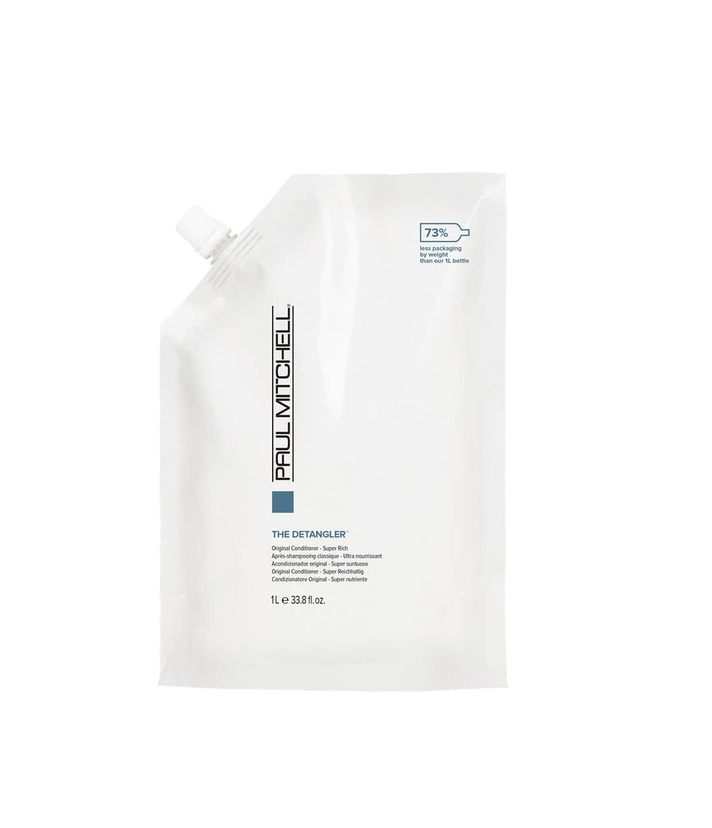 Paul Mitchell The Detangler bottle pour showcases easy detangling and smooth, manageable hair.