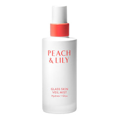 Peach & Lily Glass Skin Veil Mist bottle with sprayer delivering weightless hydration.