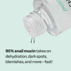 Peach Slices Snail Rescue Toner drops on hand demonstrating easy absorption