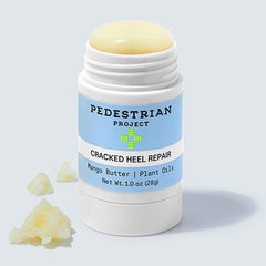 Pedestrian Project heel balm applying to a rough heel in soft, hydrated finish