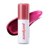 Peripera Ink Peel Off Lip Stain applies close-up for vibrant Dear Rose color.