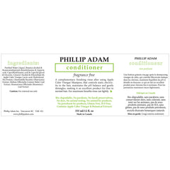 Phillip Adam apple cider vinegar bottle emphasizing gentle scalp balance.