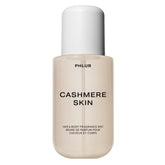 PHLUR Cashmere Skin Mist bottle on vanity for everyday layering