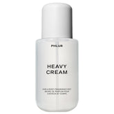PHLUR Heavy Cream bottle close-up highlighting a creamy fragrance blend for all-day wear