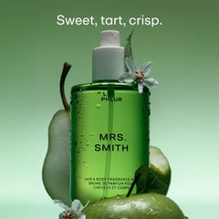 PHLUR Mrs. Smith spray application demonstrates even mist for all-over fragrance.