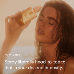 PHLUR Peach Skin Body Mist bottle closeup shows creamy core and elegant label.