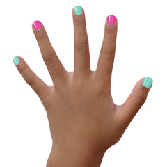 Piggy Paint Glitter Topcoat bottle adds sparkle without harsh chemicals.