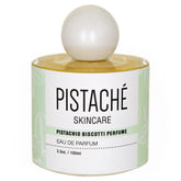 Pistaché Skincare Pistachio Biscotti Perfume bottle close-up showcasing a luxe glass.