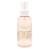 Pistache Skincare Pistachio Oil Body Mist bottle releasing sweet biscotti aroma for daily refresh.