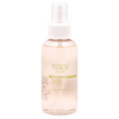 Pistache Skincare Pistachio Oil Body Mist bottle releasing sweet biscotti aroma for daily refresh.