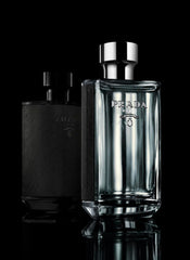 Prada L'Homme EDT cap close-up showing minimalist design.