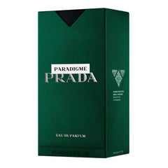 Prada Paradigme woody-musk heart closeup signals refined modern sophistication.