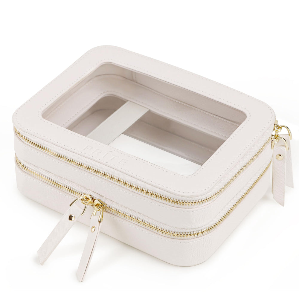 Prite double-layer makeup bag in beige with gold zipper for organized travel cosmetics.