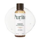 Purito Fermented Complex 94 boosting essence bottle closeup highlights packaging and hydration boost.
