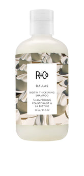 R+Co Dallas Thickening Shampoo bottle front showing volumizing biotin benefits for fine hair
