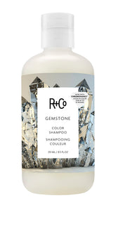R+Co Gemstone bottle pours, color-preserving care in action for color longevity.