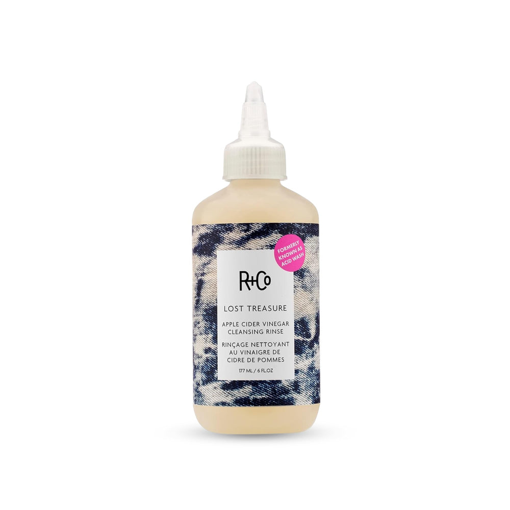 R+Co Lost Treasure ACV Cleansing Rinse bottle demonstrates gentle, color-safe cleansing
