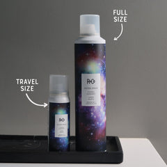 R+Co Outerspace Light Hair Spray hand-application shows quick on-the-go touch-ups