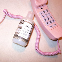 R+Co Ring Tone hair curl-definition demonstrates elongation and bounce.